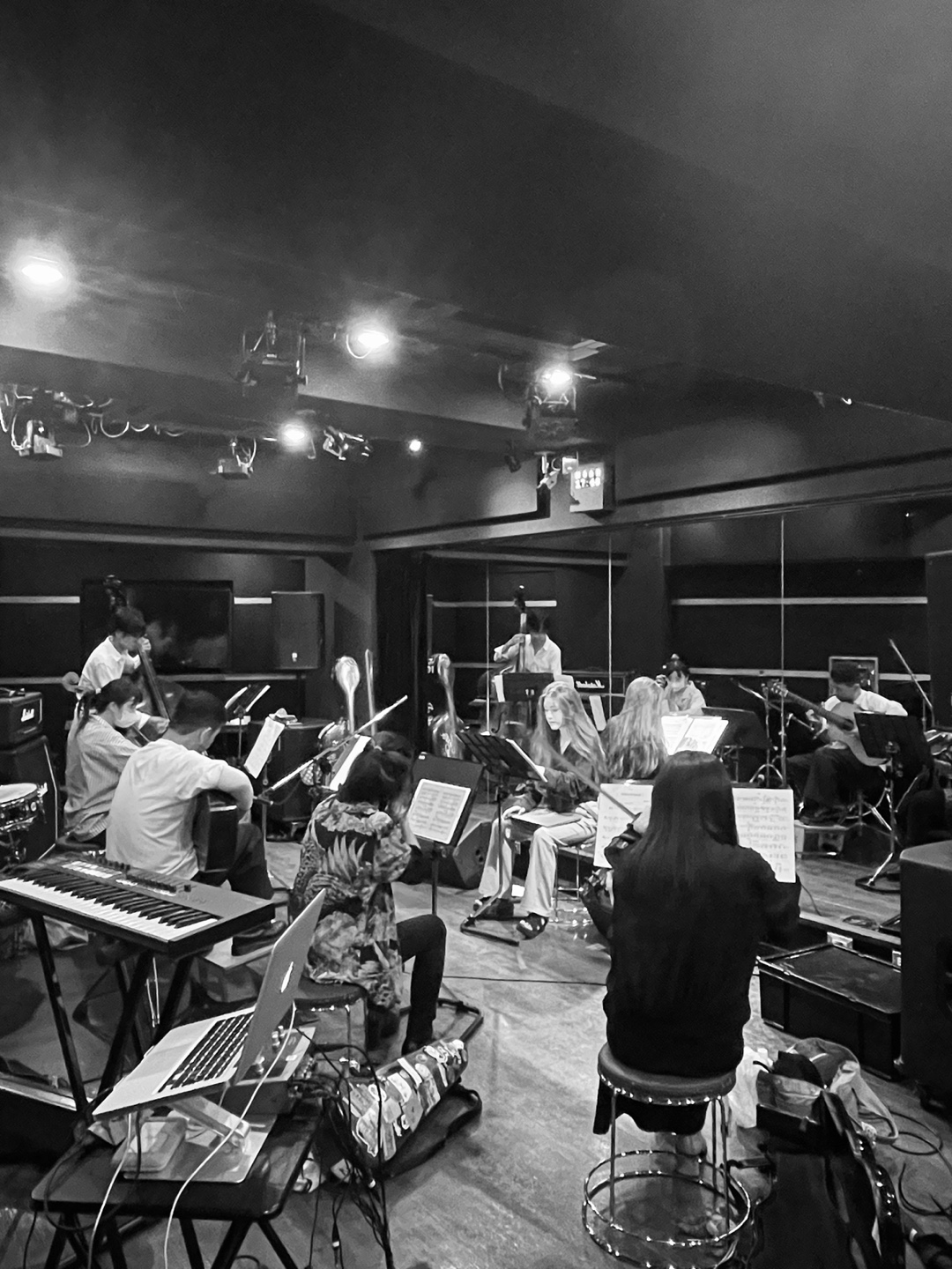 Chae-Yoon Park working with musicians during an ensemble rehearsal